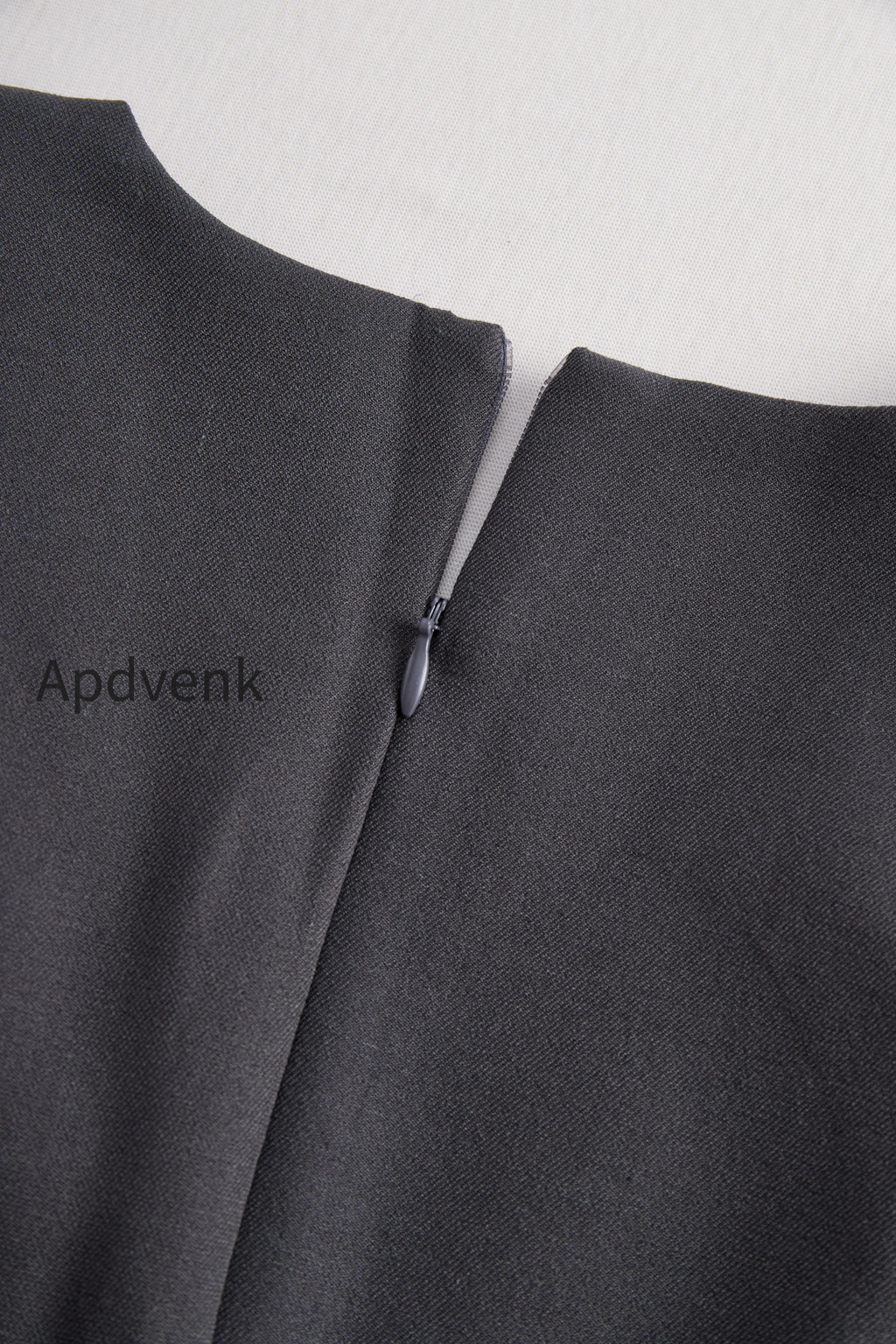 sophisticated-sleeveless-peplum-jumpsuit-in-charcoal-gray