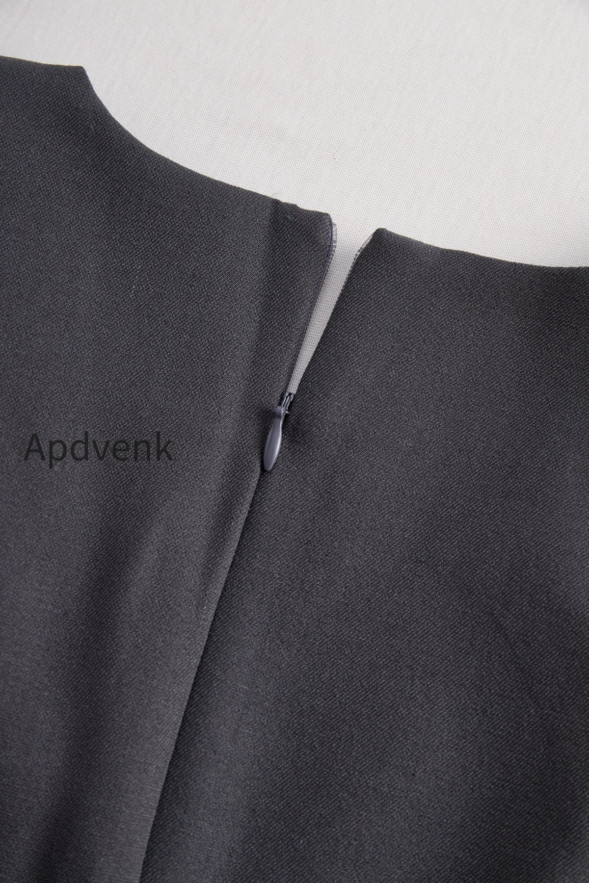 sophisticated-sleeveless-peplum-jumpsuit-in-charcoal-gray