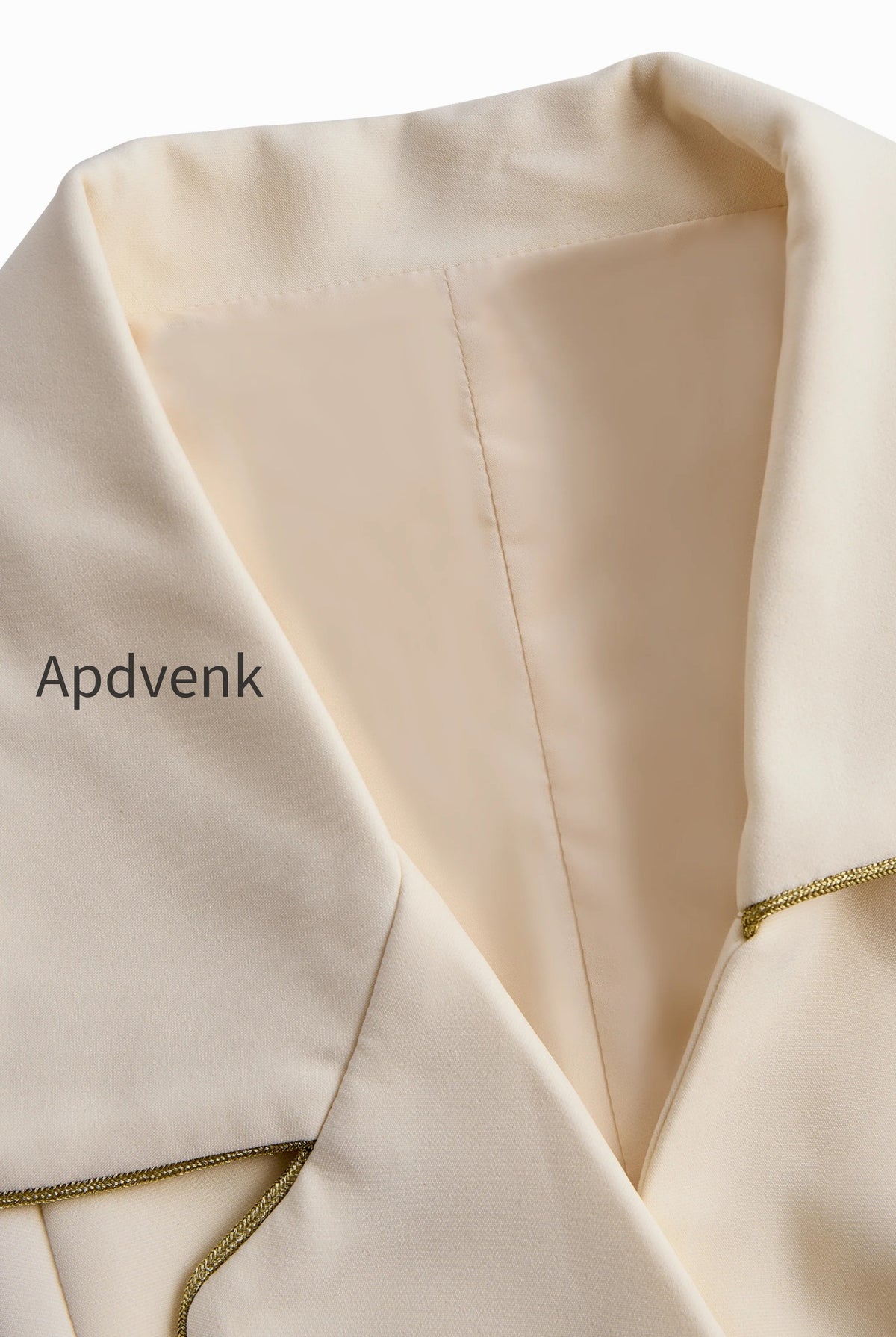 white-sleeveless-blazer-romper-with-gold-trim